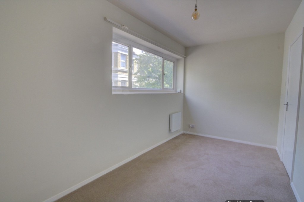 Lot: 147 - TWO-BEDROOM APARTMENT WITH SEA VIEWS - Flat 1 - bedroom before tenant moved in provided by the seller